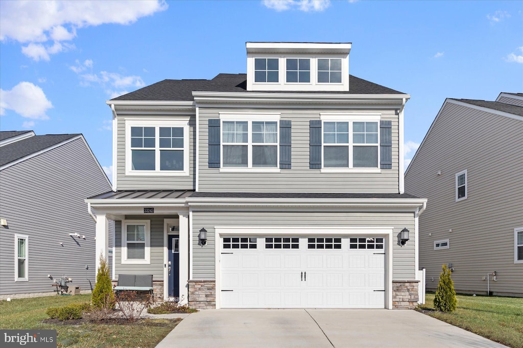 view of front of property featuring a garage