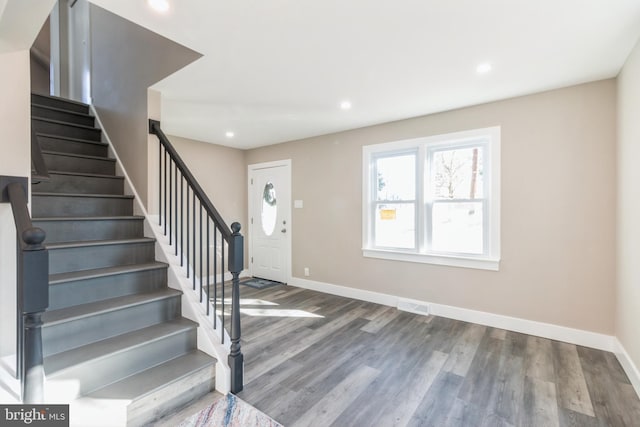 entrance foyer featuring hardwood / wood-style flooring