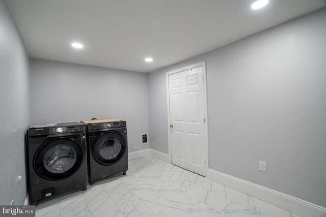 laundry area featuring washer and clothes dryer