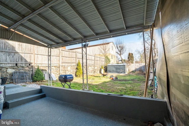 unfurnished sunroom with a wealth of natural light and vaulted ceiling