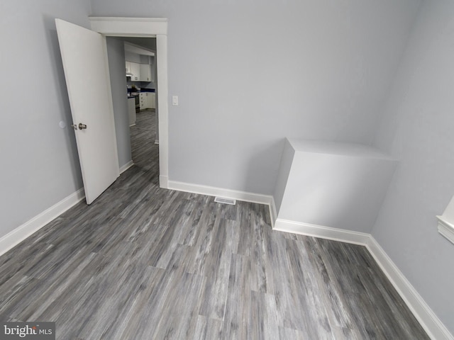 interior space with dark wood-type flooring