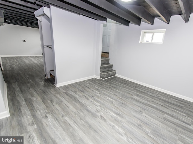 basement with wood-type flooring