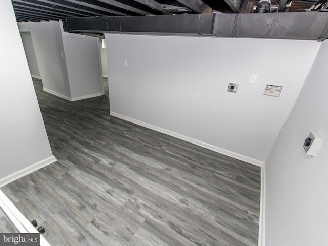 basement featuring dark wood-type flooring