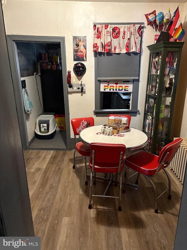 dining area featuring hardwood / wood-style flooring