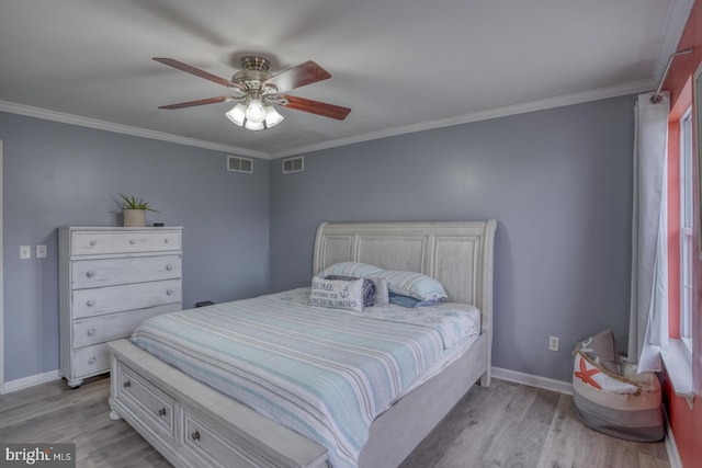 bedroom with ceiling fan, light hardwood / wood-style floors, and ornamental molding