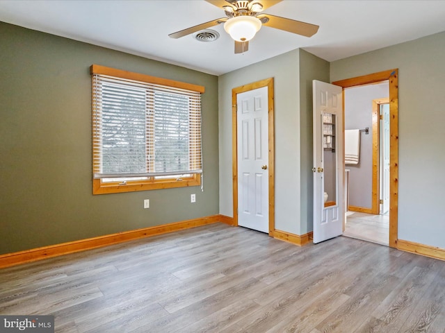 unfurnished bedroom featuring light hardwood / wood-style flooring and ceiling fan