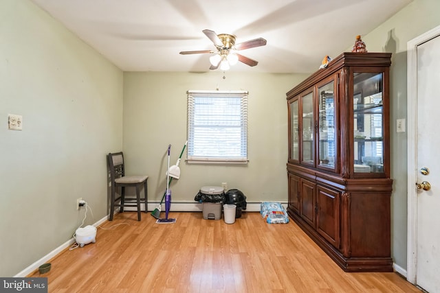 miscellaneous room featuring light hardwood / wood-style flooring and ceiling fan