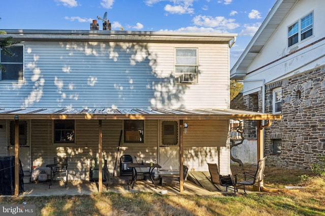 rear view of house with a patio area