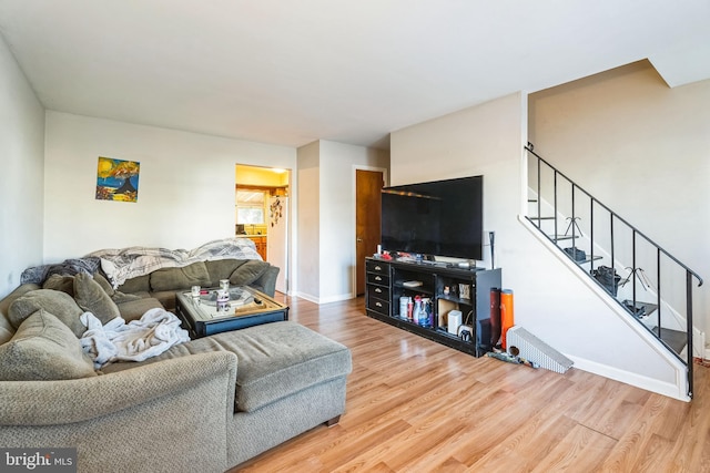 living room with hardwood / wood-style floors