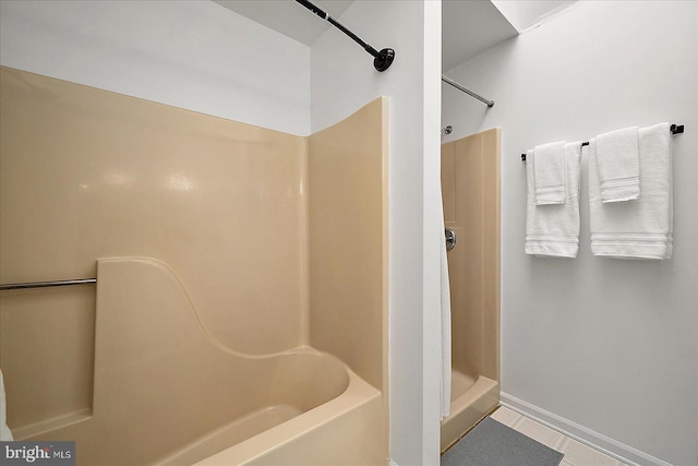 bathroom featuring tile patterned flooring and walk in shower