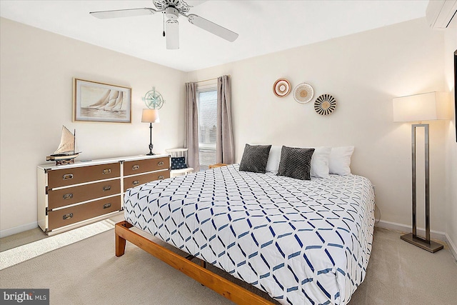 bedroom with a wall mounted air conditioner, light colored carpet, and ceiling fan