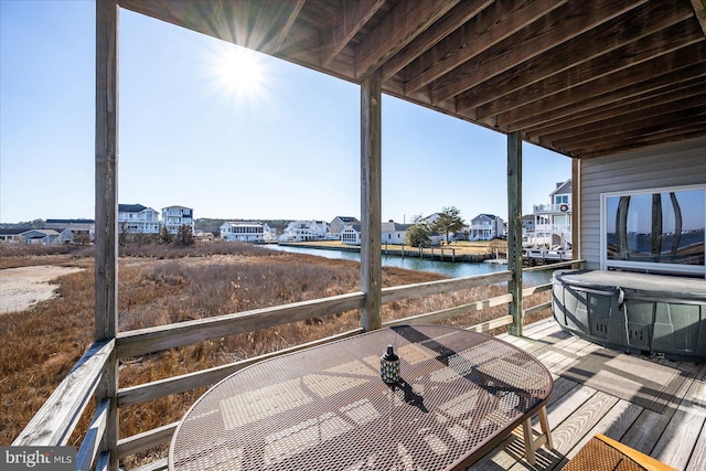 deck featuring a water view