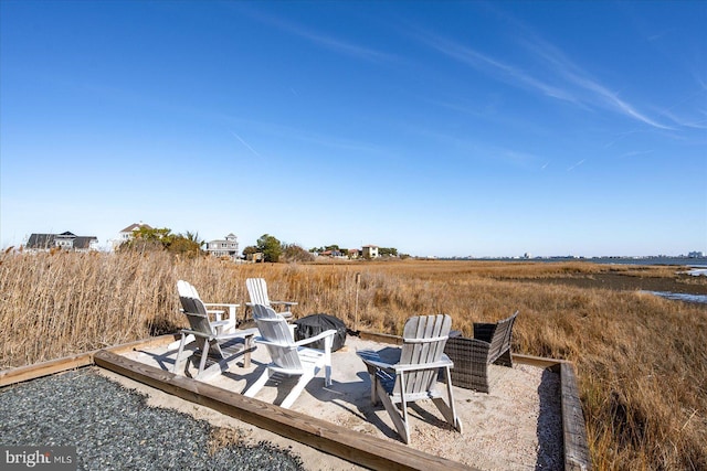 view of patio featuring an outdoor fire pit