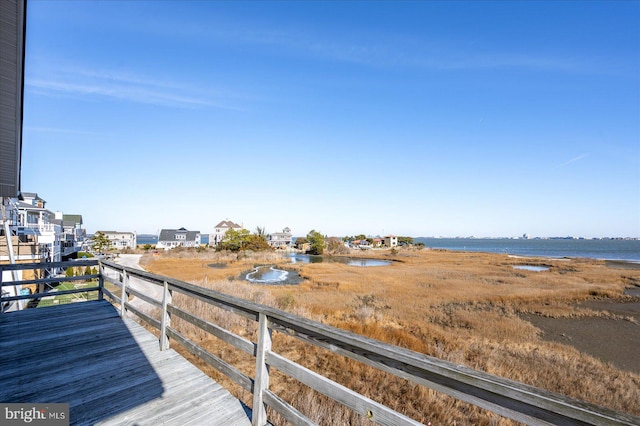 exterior space with a water view