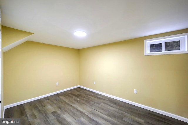 basement featuring hardwood / wood-style floors