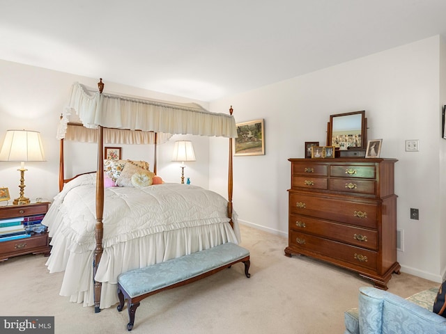 bedroom with light carpet