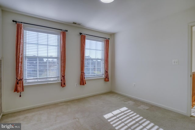 view of carpeted spare room