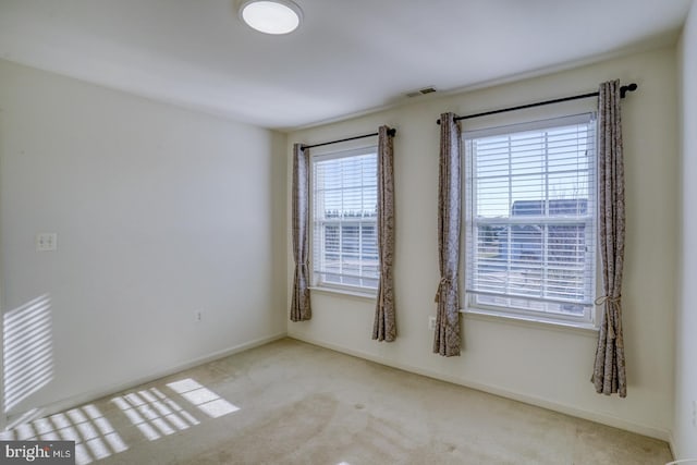 view of carpeted spare room