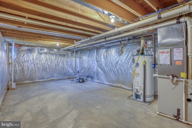 basement with heating unit and water heater