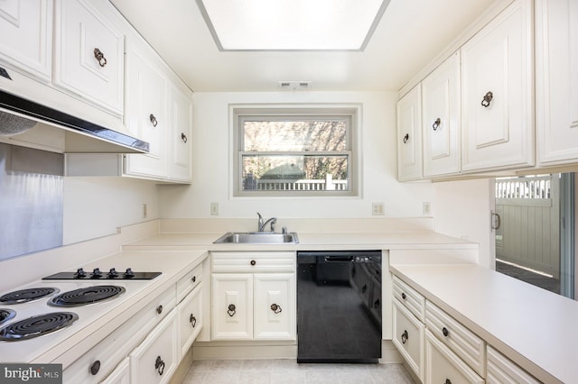 kitchen with light tile patterned flooring, sink, white cabinetry, white electric cooktop, and dishwasher