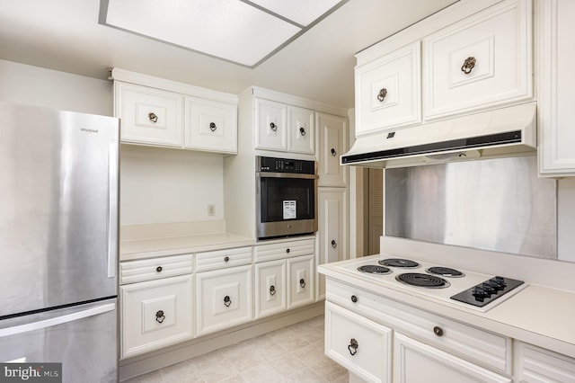 kitchen with white cabinetry and appliances with stainless steel finishes