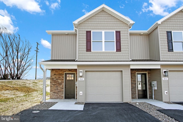 view of property featuring a garage