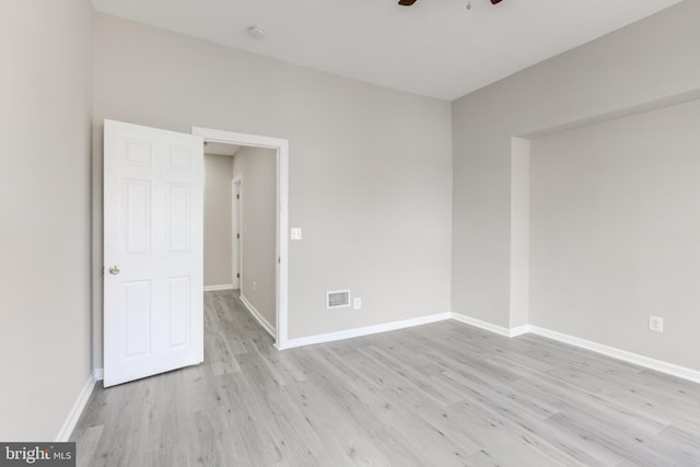 unfurnished room featuring ceiling fan and light hardwood / wood-style floors