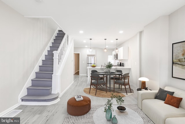 living room featuring light hardwood / wood-style flooring