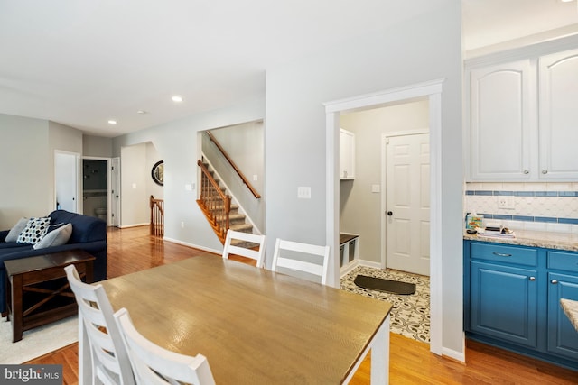 dining room with light hardwood / wood-style flooring