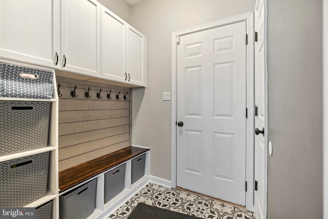 mudroom featuring light tile patterned flooring