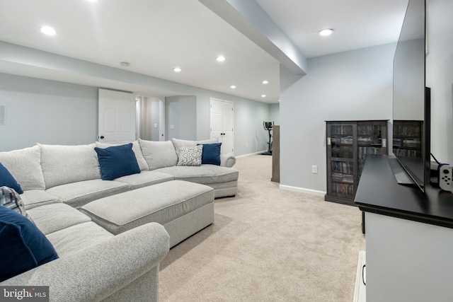 living room featuring light carpet