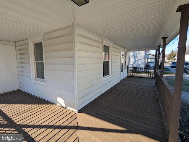 wooden deck featuring a porch