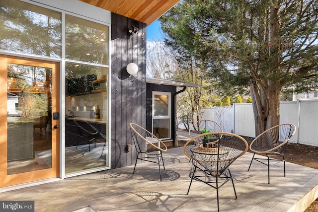 view of patio featuring fence