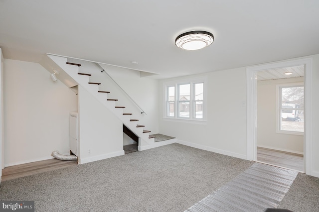 basement with light colored carpet