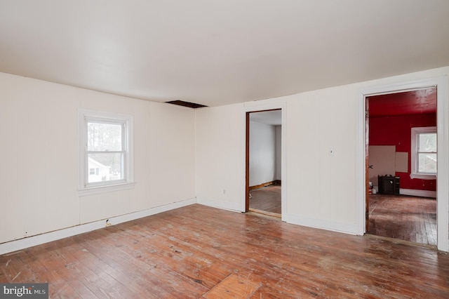 empty room featuring hardwood / wood-style floors