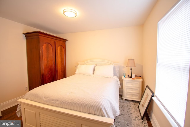 bedroom featuring wood-type flooring