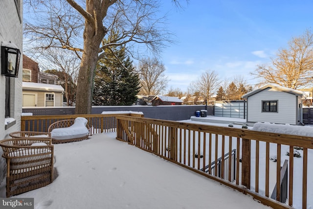 view of snow covered deck