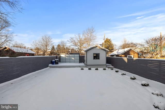 view of yard covered in snow