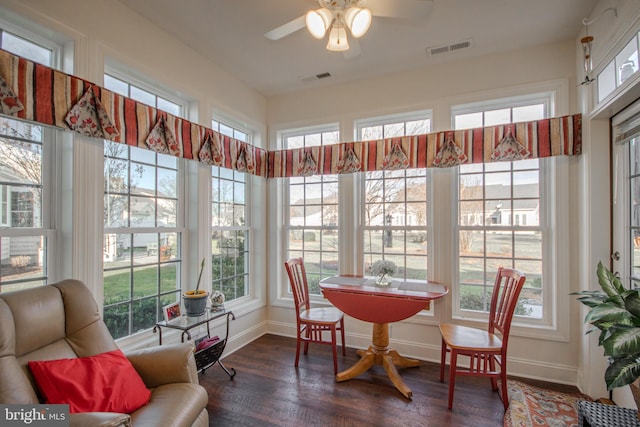 sunroom with ceiling fan