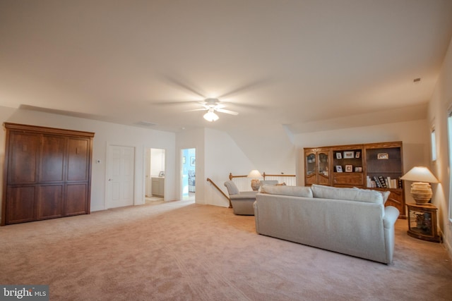 living room with light carpet and ceiling fan