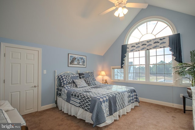 carpeted bedroom featuring ceiling fan and lofted ceiling