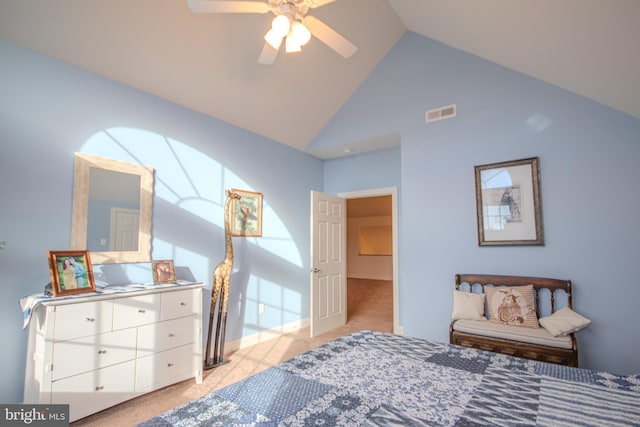 bedroom featuring light carpet, vaulted ceiling, and ceiling fan