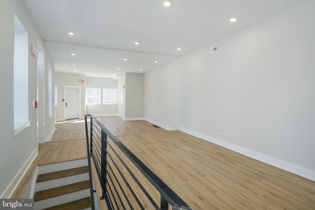 unfurnished room with light hardwood / wood-style floors