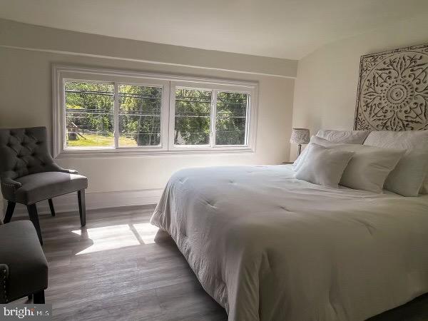 517 S Ave, Bridgeton, NJ 08302 - bedroom with baseboards and wood finished floors