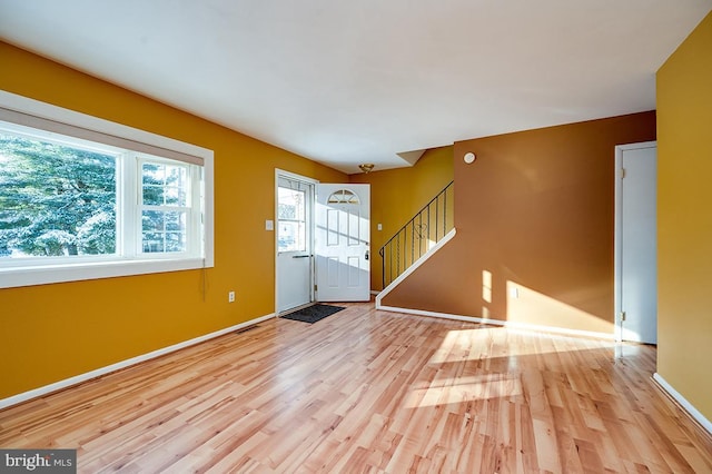 foyer with light wood-type flooring