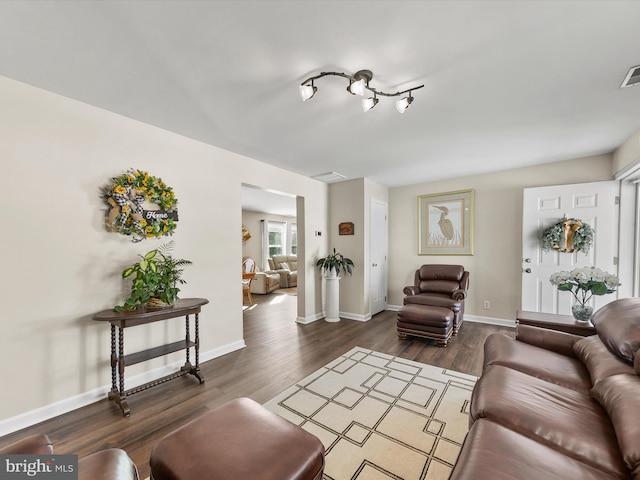 living room featuring dark hardwood / wood-style flooring