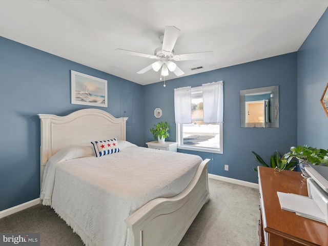 carpeted bedroom with ceiling fan