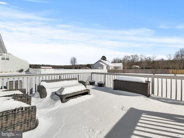 snow covered deck with central AC unit