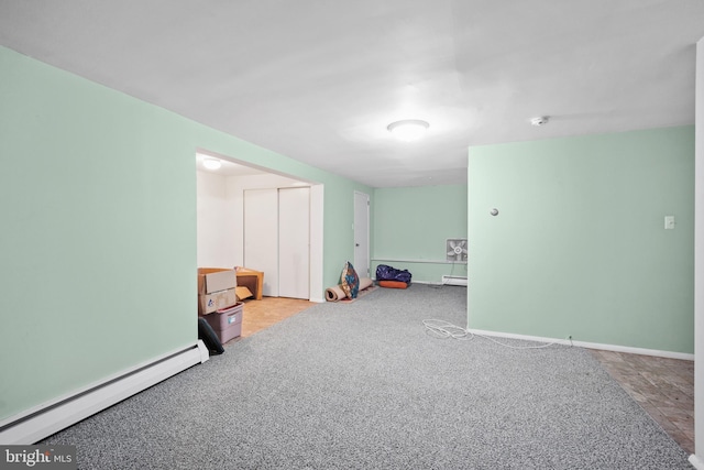 interior space featuring carpet and a baseboard radiator