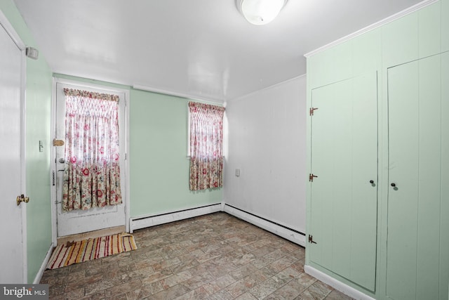 unfurnished bedroom with a baseboard radiator